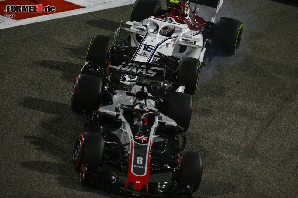 Foto zur News: Romain Grosjean (Haas) und Charles Leclerc (Sauber)