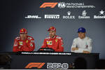 Foto zur News: Kimi Räikkönen (Ferrari), Sebastian Vettel (Ferrari) und Valtteri Bottas (Mercedes)