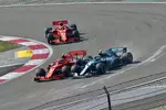 Foto zur News: Kimi Räikkönen (Ferrari) und Valtteri Bottas (Mercedes)