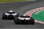 Foto zur News: Sergei Sirotkin (Williams) und Romain Grosjean (Haas)