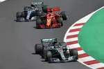 Foto zur News: Lewis Hamilton (Mercedes), Sebastian Vettel (Ferrari) und Valtteri Bottas (Mercedes)