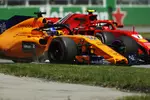 Foto zur News: Stoffel Vandoorne (McLaren) und Kimi Räikkönen (Ferrari)