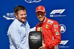 Foto zur News: Sebastian Vettel (Ferrari) und Paul Hembery