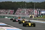 Foto zur News: Nico Hülkenberg (Renault), Carlos Sainz (Renault) und Kevin Magnussen (Haas)