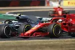 Foto zur News: Valtteri Bottas (Mercedes) und Sebastian Vettel (Ferrari)