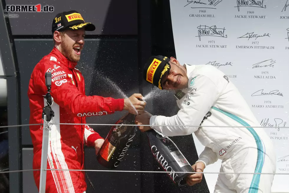 Foto zur News: Sebastian Vettel (Ferrari) und Lewis Hamilton (Mercedes)