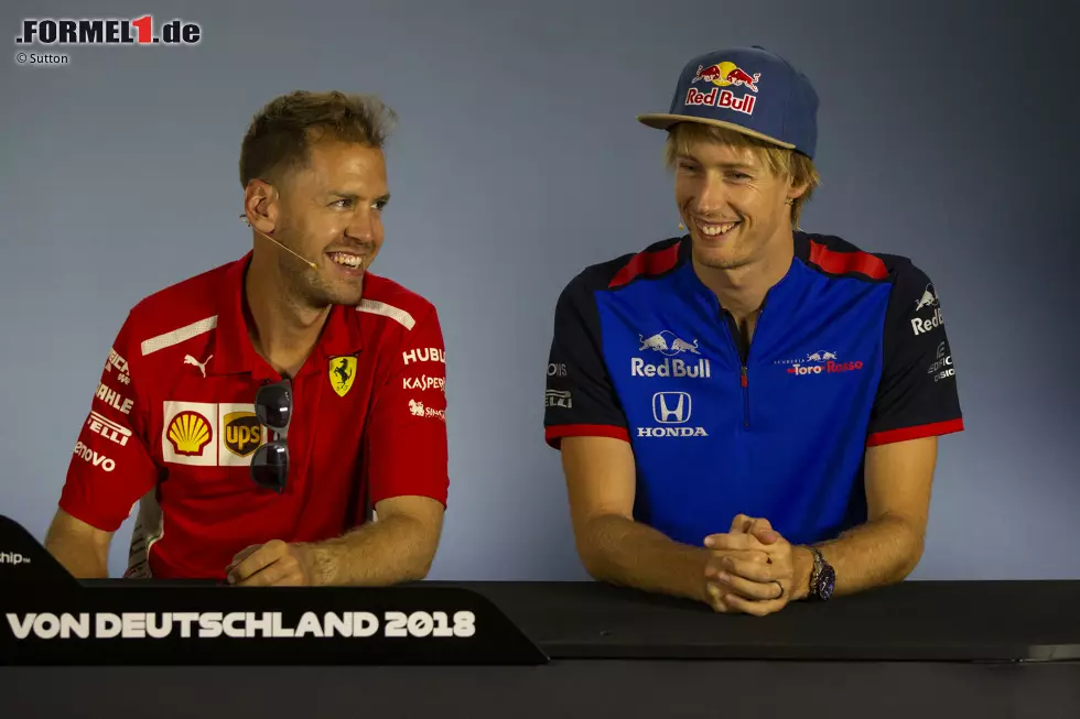 Foto zur News: Sebastian Vettel (Ferrari) und Pierre Gasly (Toro Rosso)