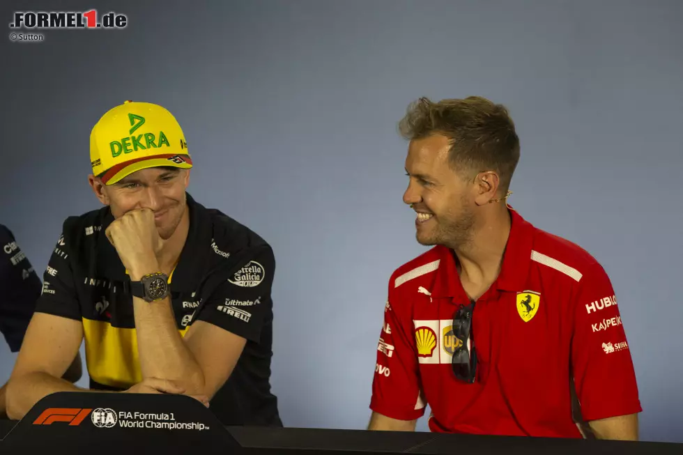 Foto zur News: Nico Hülkenberg (Renault) und Sebastian Vettel (Ferrari)