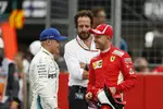 Foto zur News: Sebastian Vettel (Ferrari) und Valtteri Bottas (Mercedes)