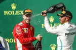 Foto zur News: Lewis Hamilton (Mercedes) und Sebastian Vettel (Ferrari)