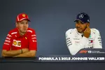 Foto zur News: Sebastian Vettel (Ferrari) und Lewis Hamilton (Mercedes)