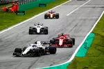 Foto zur News: Sergei Sirotkin (Williams), Sebastian Vettel (Ferrari), Lance Stroll (Williams) und Fernando Alonso (McLaren)