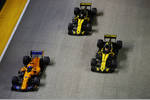 Foto zur News: Fernando Alonso (McLaren), Carlos Sainz (Renault) und Nico Hülkenberg (Renault)