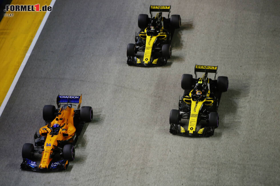 Foto zur News: Fernando Alonso (McLaren), Carlos Sainz (Renault) und Nico Hülkenberg (Renault)