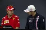 Foto zur News: Sebastian Vettel (Ferrari) und Esteban Ocon (Racing Point)