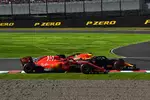 Foto zur News: Kimi Räikkönen (Ferrari) und Max Verstappen (Red Bull)