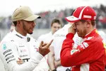 Foto zur News: Lewis Hamilton (Mercedes) und Sebastian Vettel (Ferrari)