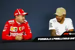 Foto zur News: Sebastian Vettel (Ferrari) und Lewis Hamilton (Mercedes)