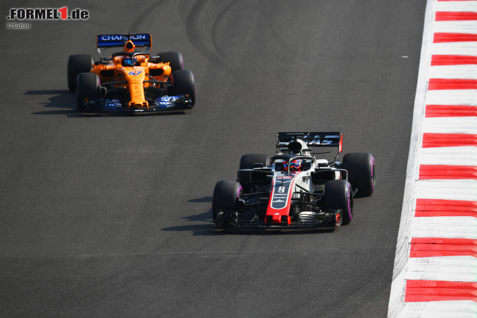 Foto zur News: Romain Grosjean (Haas) und Lando Norris