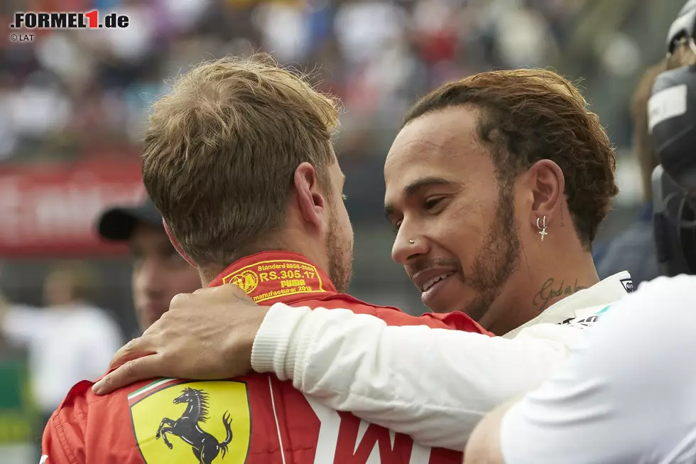 Foto zur News: Sebastian Vettel (Ferrari) und Lewis Hamilton (Mercedes)