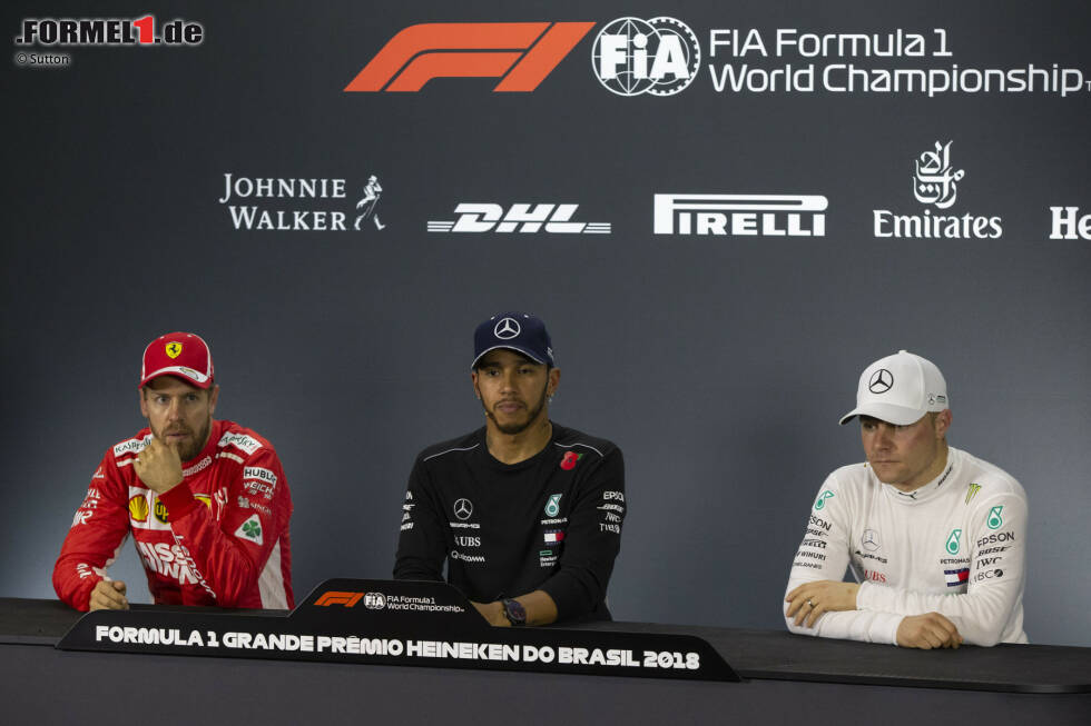 Foto zur News: Sebastian Vettel (Ferrari), Lewis Hamilton (Mercedes) und Valtteri Bottas (Mercedes)