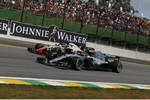 Foto zur News: Kevin Magnussen (Haas) und Valtteri Bottas (Mercedes)