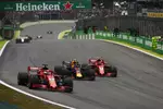 Foto zur News: Sebastian Vettel (Ferrari), Max Verstappen (Red Bull) und Kimi Räikkönen (Ferrari)