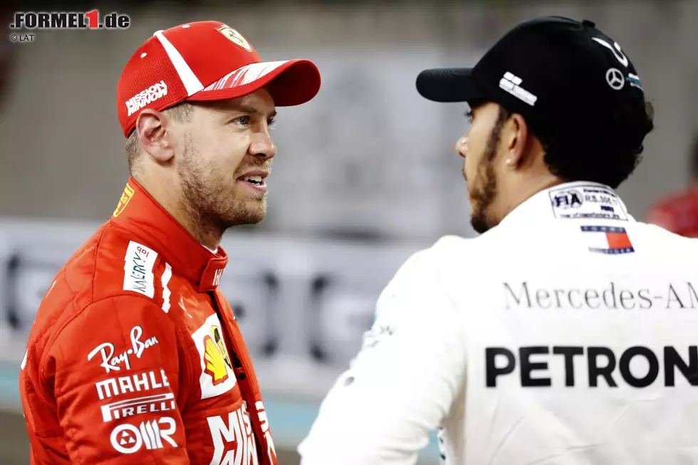 Foto zur News: Sebastian Vettel (Ferrari) und Lewis Hamilton (Mercedes)