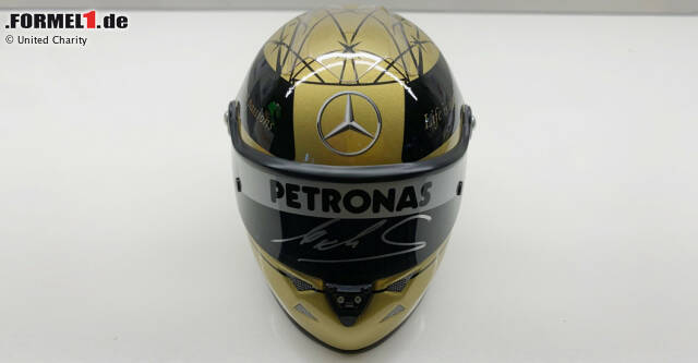 Foto zur News: Motorsport-Rarität: Ein Mini-Helm im Original-Design von Michael Schumacher