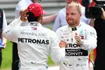 Foto zur News: Lewis Hamilton (Mercedes) und Valtteri Bottas (Mercedes)