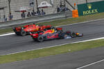 Foto zur News: Sebastian Vettel (Ferrari) und Max Verstappen (Red Bull)