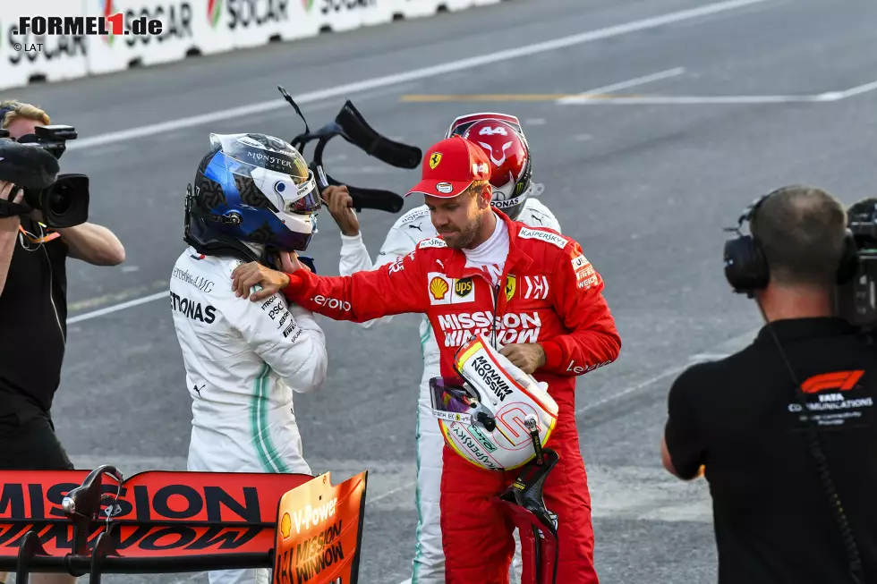 Foto zur News: Sebastian Vettel (Ferrari) und Valtteri Bottas (Mercedes)