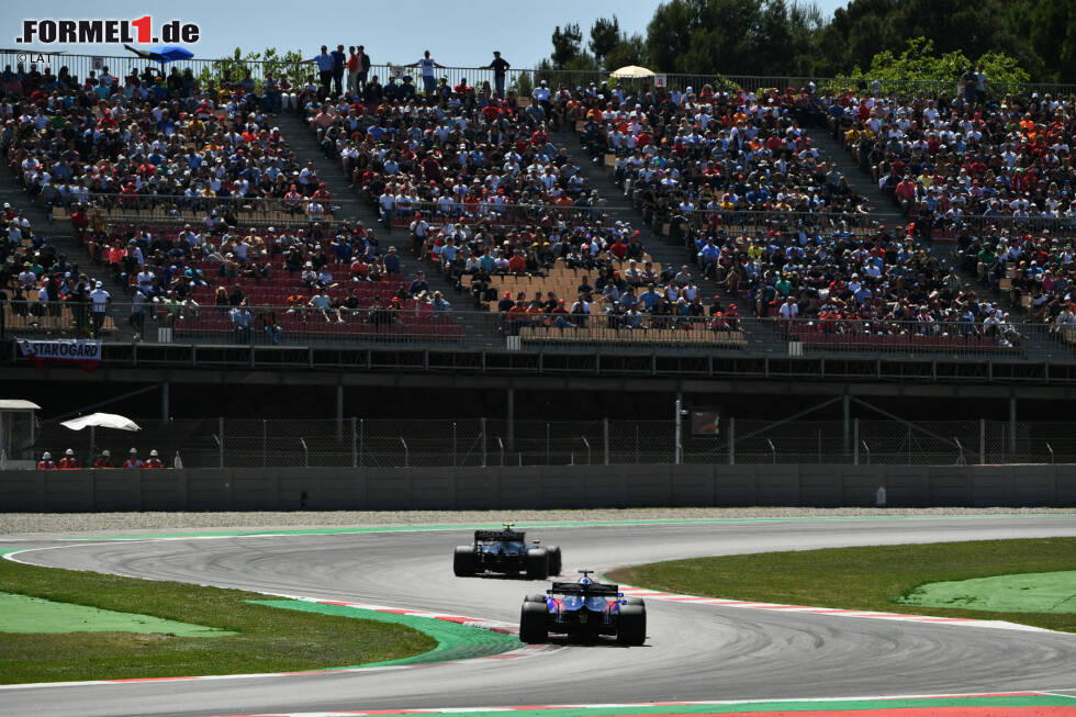 Foto zur News: Kevin Magnussen (Haas) und Daniil Kwjat (Toro Rosso)