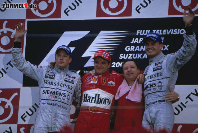 Foto zur News: Sein 50. Rennen feiert der "Iceman" 2003 in Japan. Dort steht er als Zweiter hinter Rubens Barrichello auf dem Podium. Freuen kann er sich aber nicht, denn in diesem Rennen verliert er die WM um zwei Punkte an Michael Schumacher.