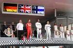 Foto zur News: Sebastian Vettel (Ferrari), Lewis Hamilton (Mercedes) und Valtteri Bottas (Mercedes)