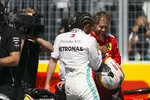 Foto zur News: Lewis Hamilton (Mercedes) und Sebastian Vettel (Ferrari)