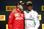 Foto zur News: Sebastian Vettel (Ferrari) und Lewis Hamilton (Mercedes)