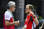 Foto zur News: Beat Zehnder (Alfa Romeo) und Sebastian Vettel (Ferrari)