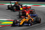 Foto zur News: Lando Norris (McLaren), Sebastian Vettel (Ferrari) und Max Verstappen (Red Bull)