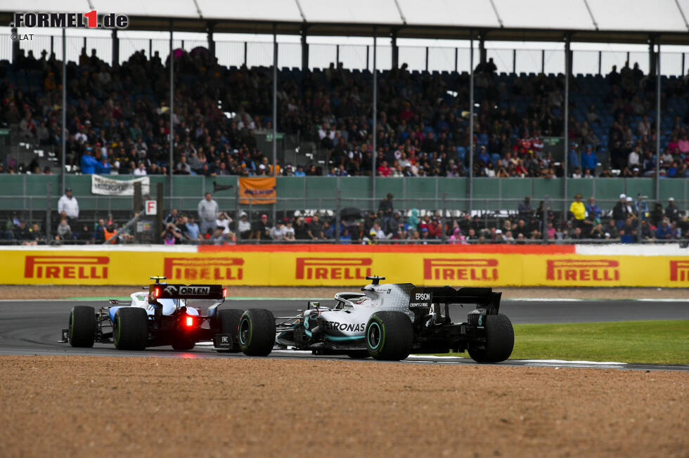 Foto zur News: Robert Kubica (Williams) und Lewis Hamilton (Mercedes)
