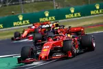 Foto zur News: Charles Leclerc (Ferrari), Max Verstappen (Red Bull) und Sebastian Vettel (Ferrari)