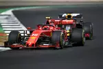 Foto zur News: Charles Leclerc (Ferrari) und Max Verstappen (Red Bull)