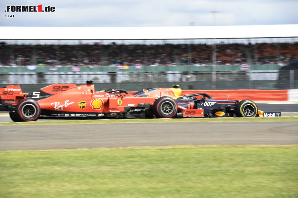Foto zur News: Pierre Gasly (Red Bull) und Sebastian Vettel (Ferrari)