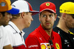 Foto zur News: Sebastian Vettel (Ferrari) und Kimi Räikkönen (Alfa Romeo)