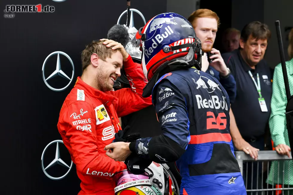 Foto zur News: Sebastian Vettel (Ferrari) und Daniil Kwjat (Toro Rosso)