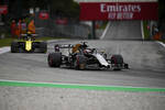 Foto zur News: Romain Grosjean (Haas) und Nico Hülkenberg (Renault)