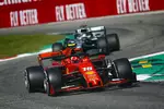 Foto zur News: Charles Leclerc (Ferrari) und Lewis Hamilton (Mercedes)