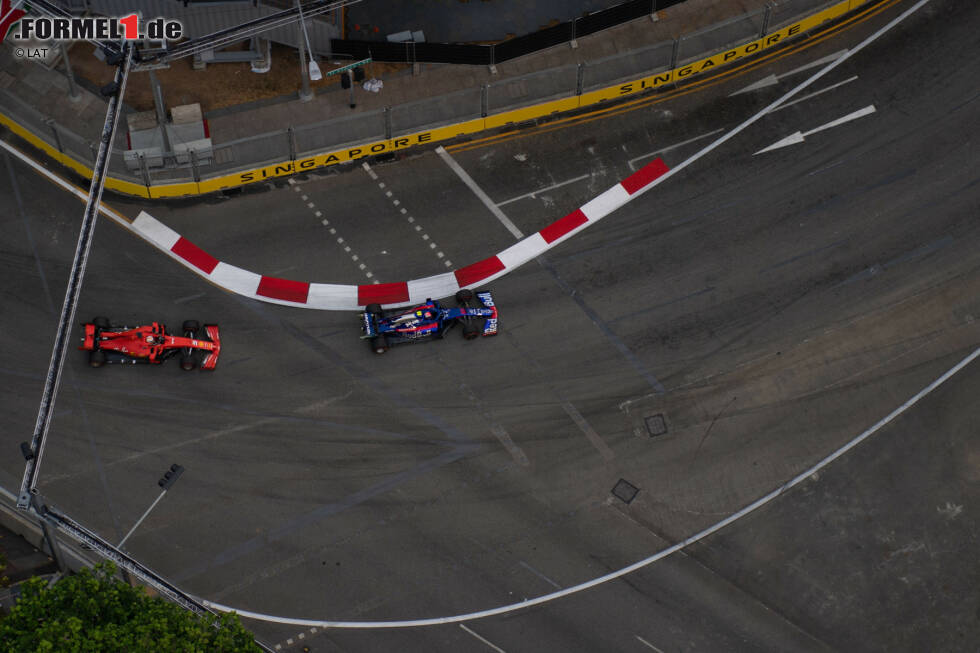 Foto zur News: Pierre Gasly (Toro Rosso) und Sebastian Vettel (Ferrari)