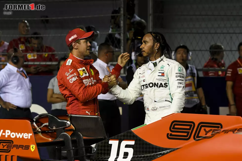 Foto zur News: Sebastian Vettel (Ferrari) und Lewis Hamilton (Mercedes)