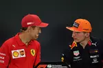 Foto zur News: Sebastian Vettel (Ferrari) und Max Verstappen (Red Bull)